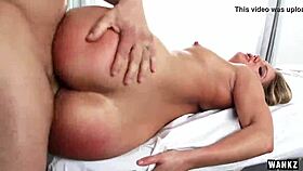 candice dare receives a relaxing massage from the skilled masseuse