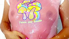 The big ass stepsister bathes in the shower wearing panties and thong.