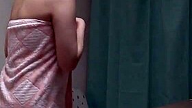 young japanese girl exposes herself during steamy shower webcam