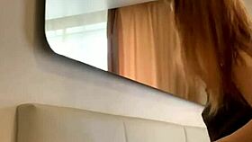 Young russian redhead dances seductively before camera