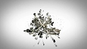 Blonde woman with large breasts relaxes on the bed.