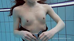 Roxalana cheh strips naked underwater in the pool.