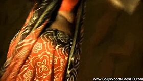 Oh, how she loves the day, this exotic Indian milf. She undresses slowly, stripping naked with cute moves to the music.