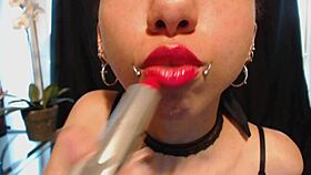 putting on hot pink lipstick drooling