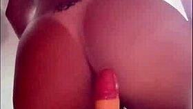 Redhead Big Ass Sits On Console Opening Shaved Pussy And Cums