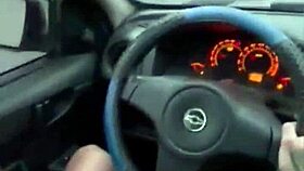 He jerks off his big cock while driving the car solo