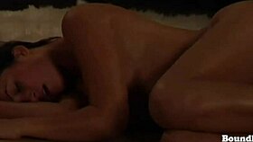 european women in a bdsm scene with strapon play.