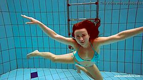 big tits petite babe deniska swims in pool underwater