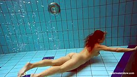 big tits petite babe deniska swims in pool underwater