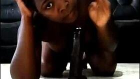 Feeling intense pleasure sucking and riding huge black dildo