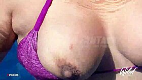 Busty pinay shows her big breasts while relaxing in the pool