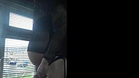 bisexual crossdresser milks publicly by the window in homemade setting