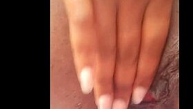 Ebony woman says, 'I'm in heat, caressing my pussy on web chat'