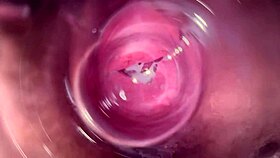 Camera dives deep into Mia's creamy tight pussy for a close view