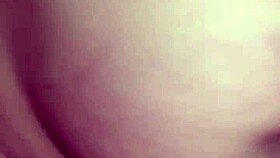 husband and wife share a homemade intimate moment