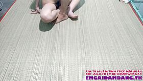 Vietnamese friends gather under the willow tree for a fun game with siblings