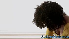 Ebony lesbian savors masseuse in steamy session! 🔥