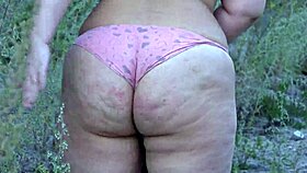 Look at this curvy milf’s big ass under tight skirt outdoors!