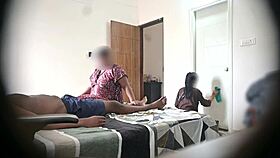In the hotel, he flashes his cock to two maids during a massage session
