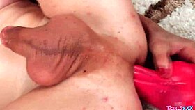 Nyxi the tgirl masturbates thirstily, craving more in her solo session.