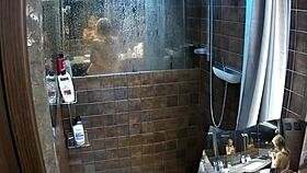 Voyeur Catches Two Girlfriends Showering Together