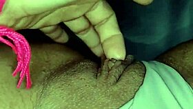 Masturbating pussy while watching porn movie