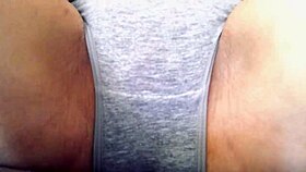 her wet pussy glistened as she touched herself with need