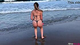 Blonde girl on the beach banging her fan hard