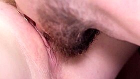 Close-up clit licking leads to loud moans and real female climax in bed