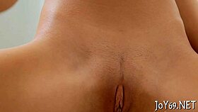 this petite teen strips naked and fingers her wet pussy solo