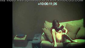 sexy babe teases with tight pussy fingering on the sofa. what’s she hiding from the camera?