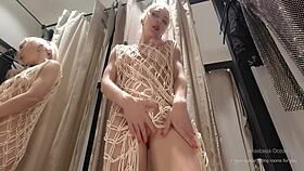 i try on clothes in fitting room with open curtain, flashing in public space for thrill.