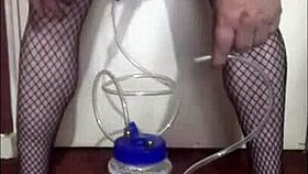 amateurs in thongs and stockings use portable milking machine for lactating bisexual crossdressing.