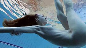 anna netrebko, tiny 18+ teen, swims underwater in public pool