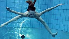 anna netrebko, tiny 18+ teen, swims underwater in public pool