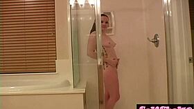 brunette teen 18+ showers while fingering her tight pussy to intense orgasm.