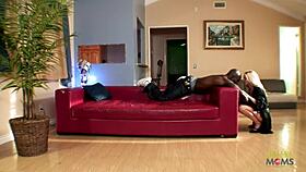 Two adorable lesbians share a big black cock together.