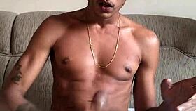 Mature amateur masturbates big cock in soccer shorts, cumming to finish.