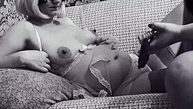 Pregnant MILF and mature girlfriend share amateur lesbian foreplay in black and white