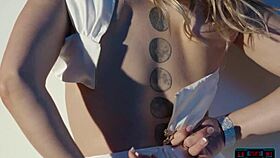 Sexy blonde milf Anna Claire Clouds strips for Playboy.