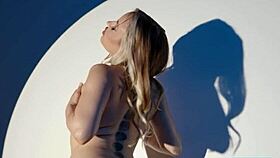 Sexy blonde milf Anna Claire Clouds strips for Playboy.