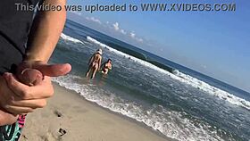 Hey, I'm jerking off at the beach watching two sexy girls in the sea who decide to help!