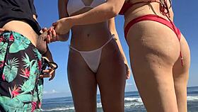 Hey, I'm jerking off at the beach watching two sexy girls in the sea who decide to help!