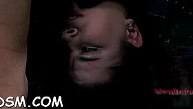 gagged girl gets clit pleasured in bondage game