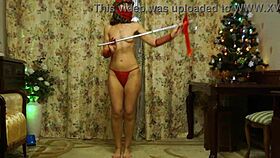 belly dancer sways in red lingerie