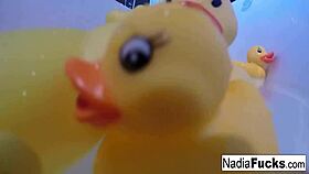 Sexy Nadia bathes with rubber duckies and masturbates her pussy 😘