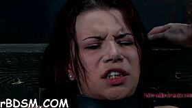 gagged girl gets clit pleasured in bondage game