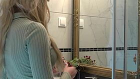 sexy blonde wife slips into new panties in the bathroom while watched