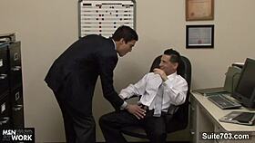 Gay workers interact in office with tattoos