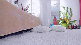 Hot curvy milf dancing and teasing in red dress with upskirt hairy pussy, showing legs and feet.